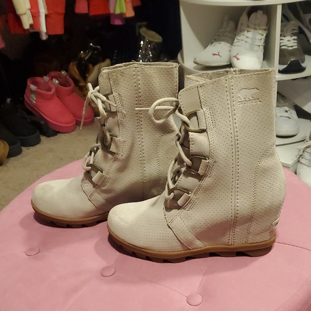 Sorel Cream Lace Up Boots with Mid Calf Height and Textured Material